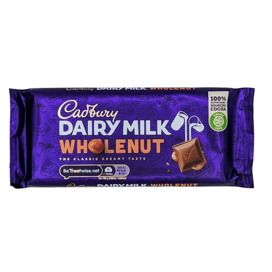 Cadbury Dairy Milk Wholenut chocolate bar packaging on a purple background
